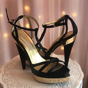 Stella McCarthy gold and black heels 8.5